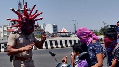 Chennai police spreading awareness wearing corona helmet