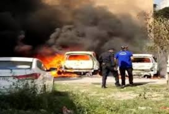 Two car caught fire in residential colony