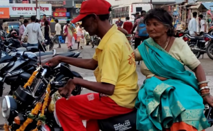 Unique example of love! Beggar bought Moped for wife