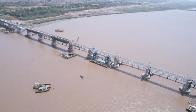 The country's largest rail bridge is being built on the Narmada river, on which double-decker goods trains will run