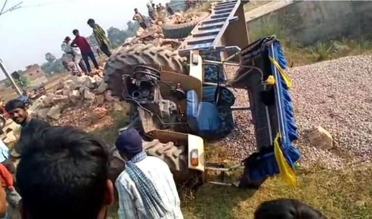 Train hits tractor, driver narrowly escaped