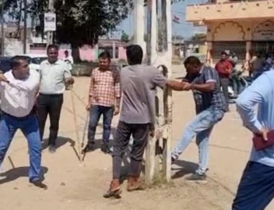 Gujarat police beat culprits who pelted stones on Garba in kheda