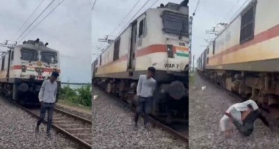 Video: रेलवे ट्रैक पर रील्स बना रहा था लड़का, तेज रफ़्तार से आई ट्रैन और...
