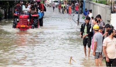 Schools closed, roads inundated, Bengaluru thrashed by rain and floods