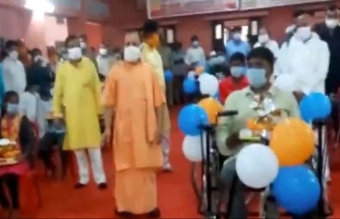 CM Yogi, distributed smartphones and tricycles to handicapped children on PM Modi's birthday