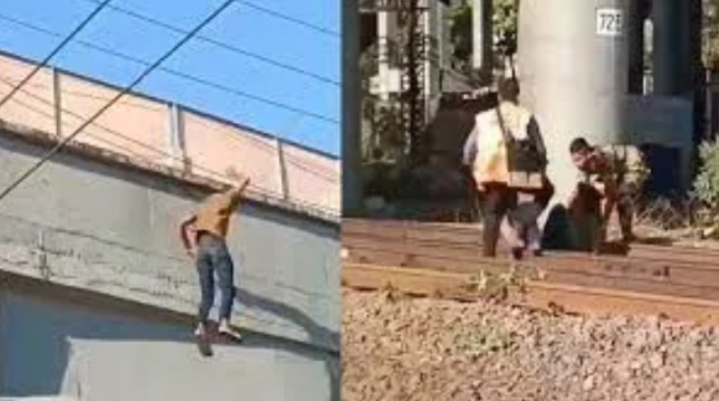 Youth jumps from footover bridge, RPF personnel save life by dragging him off tracks