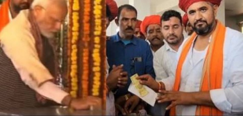 पीएम मोदी ने मंदिर में दान किए मात्र 21 रुपए, वीडियो शेयर कर कांग्रेस और सपा नेता ने बोला हमला, जानिए इसकी सच्चाई