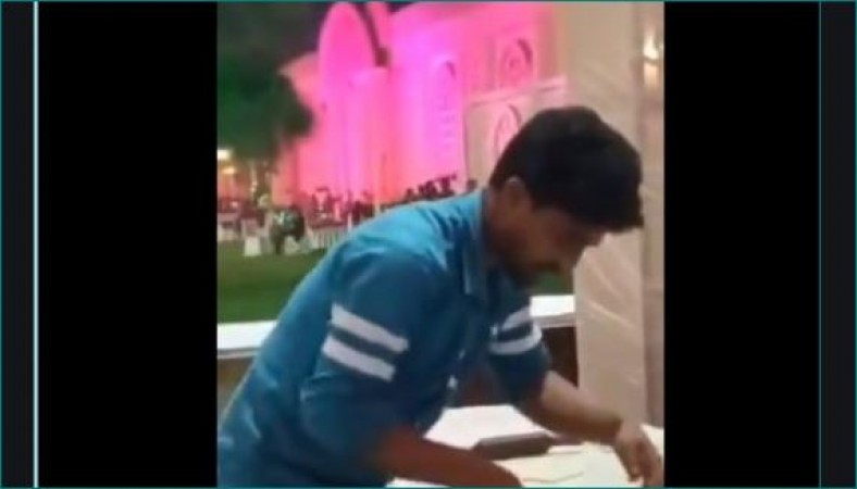 Man arrested after video of him spitting on roti goes viral