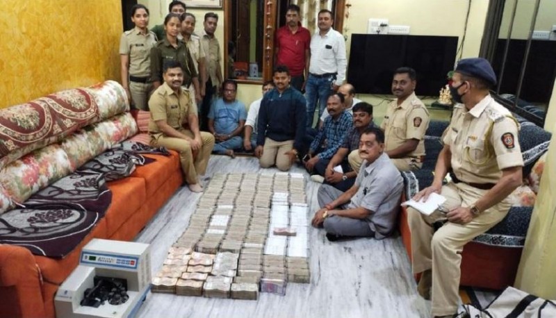 Sudden raid in flat, many cartons of notes were found