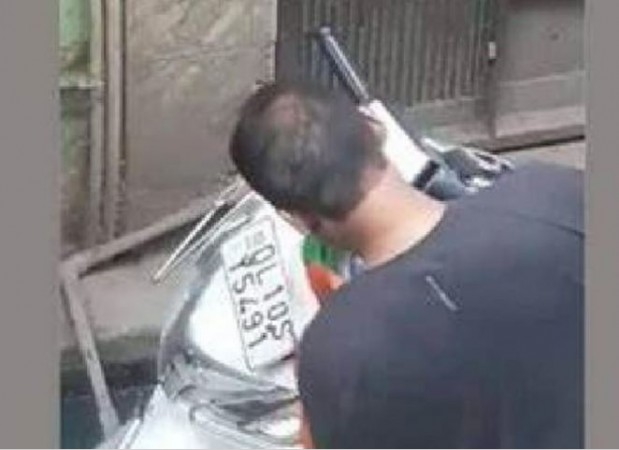 Delhi: Irfan was cleaning his scooter with tricolour, when caught...