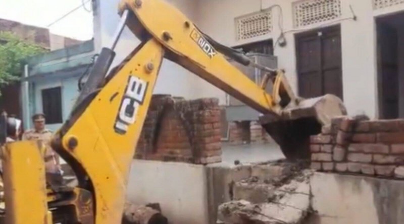 Bulldozer hurled at house of 6 accused of molesting woman