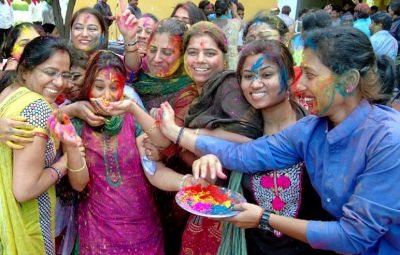 This place is strange where only women play HOLI