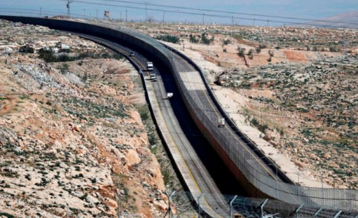 Israel is constructing a concrete wall to guard the nearby Gaza Strip's highways
