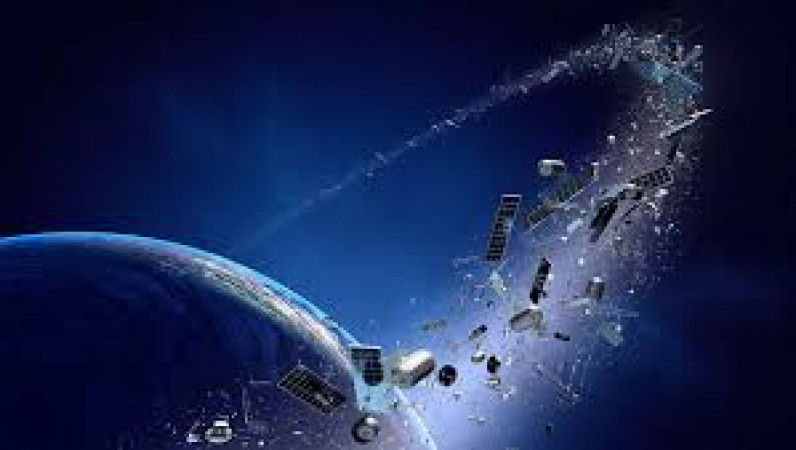 Why does a satellite not fall anywhere on earth? Where does its waste go