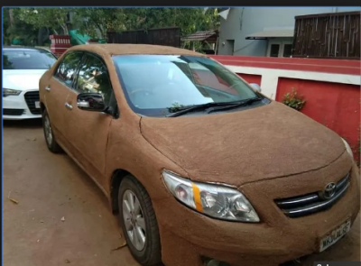 A Man paint Cow Dung all over his White Car; know here why he does like that