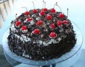 Did the Black Forest Cake get its name from the dense forests, how was this connection made?