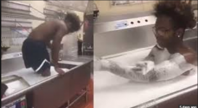 An employee takes bath in Kitchen sink, Video goes viral