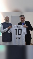 PM Modi receives Lionel Messi jersey as a gift.