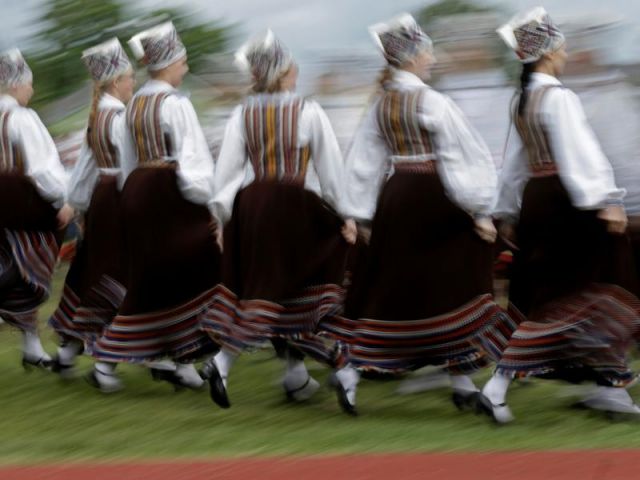 Estonian women get pleasure from their traditional dance