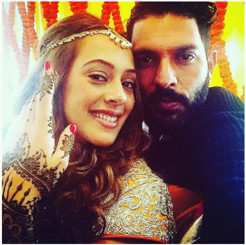 Celebration begins-See Mehendi & Sangeet Ceremony's album of Yuvraj-Hazel !!!