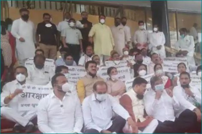 BJP MLAs protesting outside The House against suspension of 12 MLAs