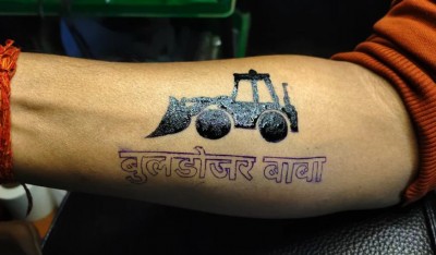 The craze of 'bulldozer baba' is rising, people getting such tattoos on their hands
