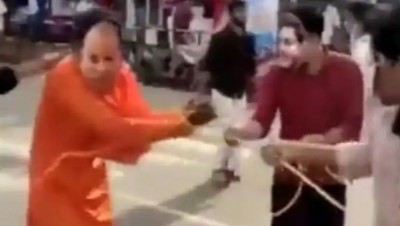 Video: man wearing CM yogi's mask dragged on road, BJP says, 'Is this Islam...'