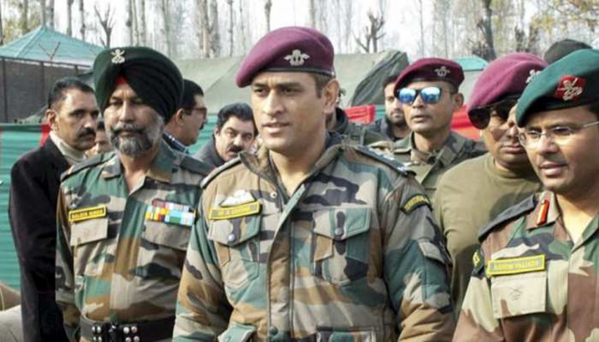 MS Dhoni plays cricket with children in military uniform