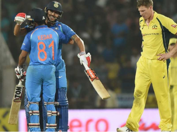 India celebrates Dusshera by beat Australia and regains the top spot in ODI.