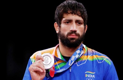Ravi won several gold medals in a row at the Asian Championships