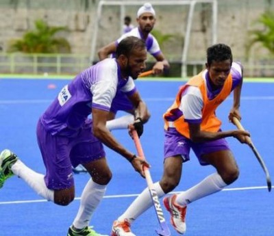 Indian hockey players start warming-up, waiting for five players including captain