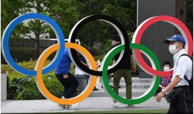 Tokyo Olympics: टोक्यो ओलंपिक में कोरोना की दस्तक, खेल गाँव में मिला पहला पॉजिटिव केस