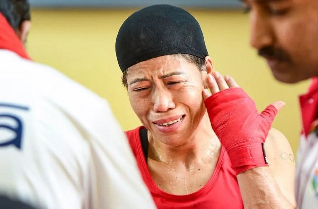 What happened in the boxing match that got injured Mary Kom