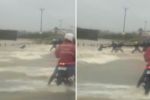 कैसे लोगो ने बाइक चालक को बाढ़ में डूबने से बचाया, देखिये वीडियो