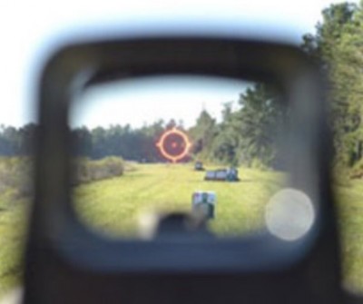 Why is the target always shot with one eye closed, there is amazing science behind it