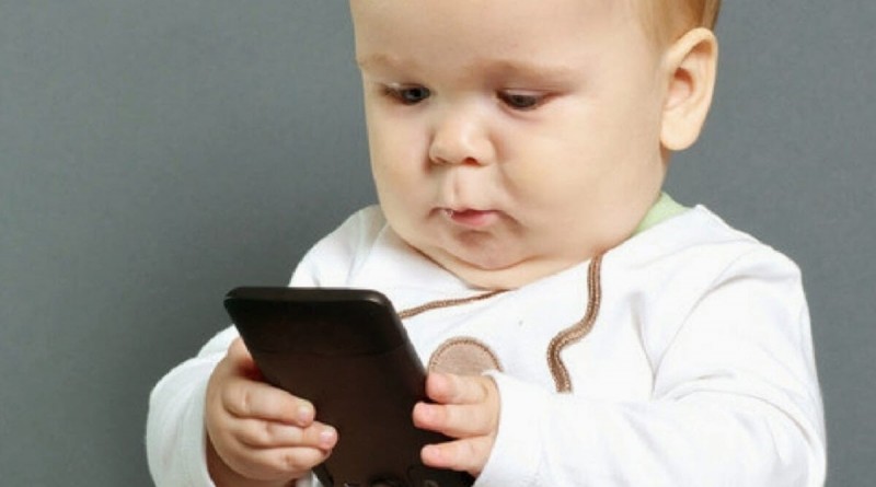 Every four-year-old child in Britain has his own tablet and mobile phone