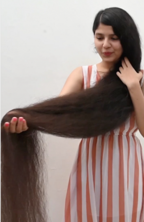 दुनिया की सबसे लम्बे बाल वाली लड़की ने कटवा डाले अपने बाल
