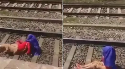 Video: The woman was talking while lying on the track, the train passed over and then...
