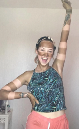 Bored woman gives herself bizarre stripy fake tan makeover by using sellotape in lockdown