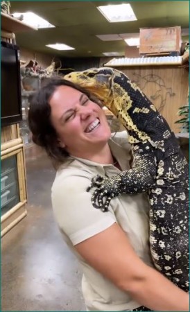 Woman seen hugging 5 ft long hunter lizard, video goes viral