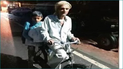Father travels 105 kilometers on bicycle to improve his son's future