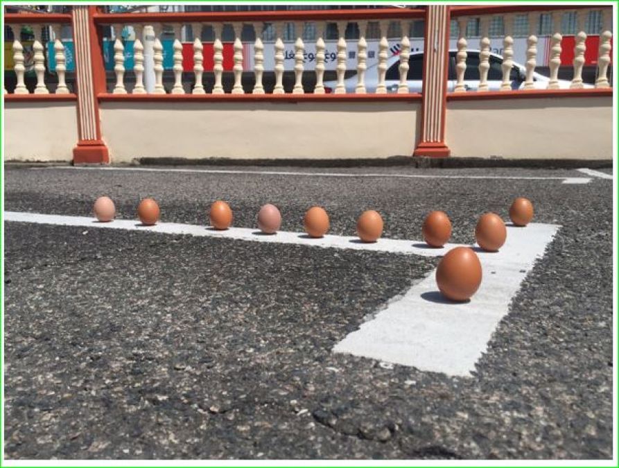 Malaysians Were Busy Balancing Eggs On Street on Last Solar Eclipse