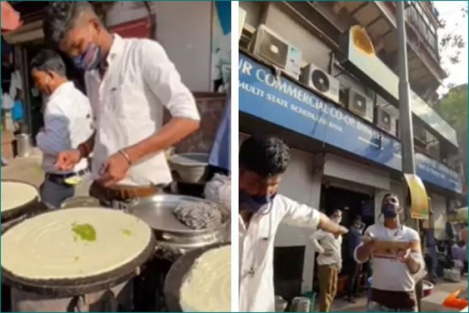This person serves flying dosa directly in customers' plate, Watch video
