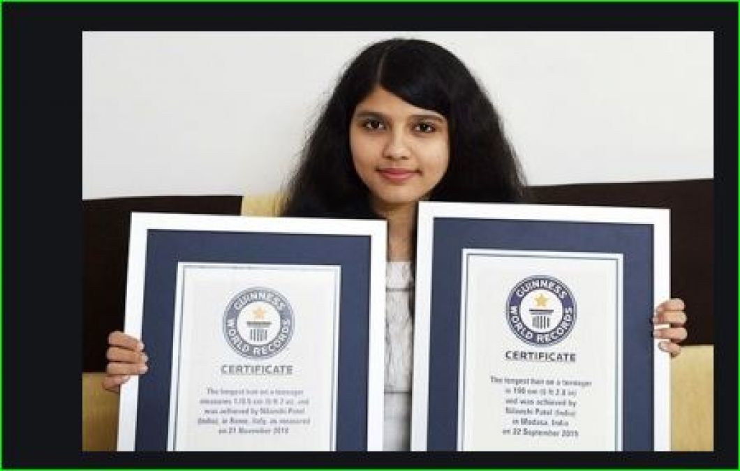 This 17 year old girl has 6 feet 2.8 inch long hair, broke her own record