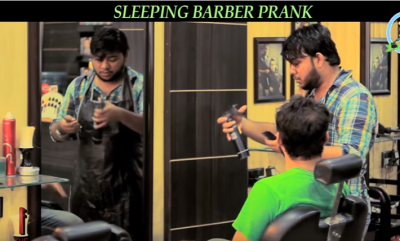 सोते हुए बार्बर काटने लगा जब लोगो के बाल, देखे वीडियो