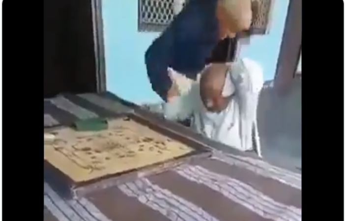 In your heart lives a child! Viral video of two elderly fighting over a carrom game round