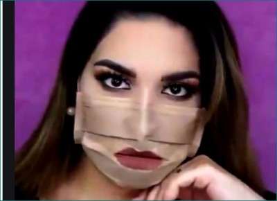 Video: Woman applies makeup on the mask
