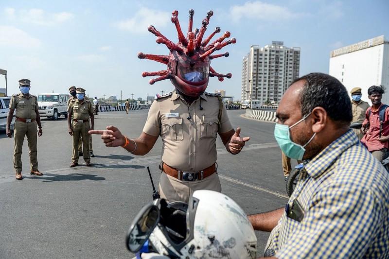 Police wear 'Corona Helmet' to warn people at this place