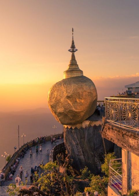 There is 'Golden Rock' in Myanmar, which has been stuck on shield for centuries