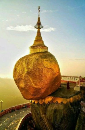 There is 'Golden Rock' in Myanmar, which has been stuck on shield for centuries